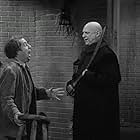 Jackie Coogan and Vito Scotti in The Addams Family (1964)