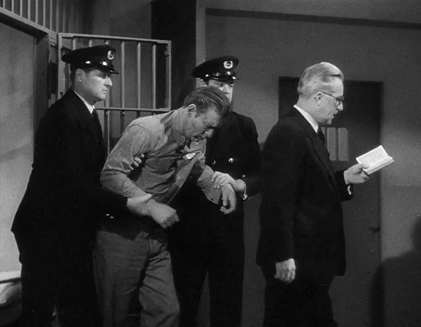 Lon Chaney Jr., James Blaine, Bob Reeves, and Paul Scott in Man Made Monster (1941)