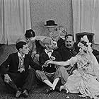 Buster Keaton, Jack Duffy, Virginia Fox, and Joe Roberts in Neighbors (1920)
