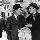 Errol Flynn and Paul Lukas in Uncertain Glory (1944)