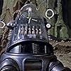 Frankie Darro, Marvin Miller, and Robby the Robot in Forbidden Planet (1956)