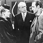 Basil Rathbone, Hillary Brooke, and John Burton in The Woman in Green (1945)