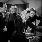 Hugh Burden, Emrys Jones, Eric Portman, and Googie Withers in One of Our Aircraft Is Missing (1942)