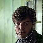 Tom Burke in The Wonder (2022)