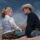 William Holden and Eleanor Parker in Escape from Fort Bravo (1953)