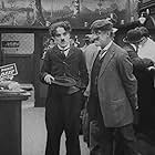 Charles Chaplin, John Rand, and Leo White in The Vagabond (1916)