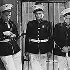 Lew Ayres, James Burke, and Maynard Holmes in The Leathernecks Have Landed (1936)