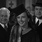 Barbara Stanwyck, Edward Arnold, and Harry Holman in Meet John Doe (1941)