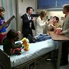 David Arquette, Jonathan Silverman, Kelly Hu, Greg Germann, Lori Loughlin, and Jackson Bond in In Case of Emergency (2007)