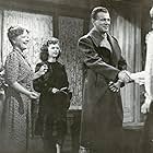 Shirley Temple, Joseph Cotten, Ginger Rogers, and Spring Byington in I'll Be Seeing You (1944)