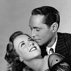 Deanna Durbin and Franchot Tone in His Butler's Sister (1943)