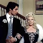 Timothy Dalton and Mae West in Sextette (1977)
