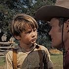 Kevin Corcoran and Chuck Connors in Old Yeller (1957)