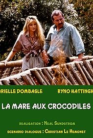 Arielle Dombasle and Ryno Hattingh in La mare aux crocodiles (1994)