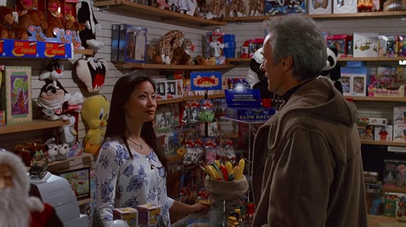 Clint Eastwood and Lucy Liu in True Crime (1999)