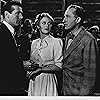 Bing Crosby, Joan Caulfield, and Robert Shayne in Welcome Stranger (1947)