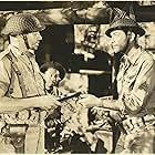 Robert Taylor, Alex Havier, and George Murphy in Bataan (1943)