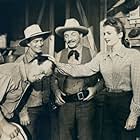 Spade Cooley, Carole Mathews, Dub Taylor, and Philip Van Zandt in Outlaws of the Rockies (1945)