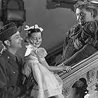 Charles Laughton, Robert Young, and Margaret O'Brien in The Canterville Ghost (1944)