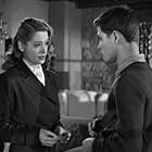 Jane Greer and Dickie Moore in Out of the Past (1947)