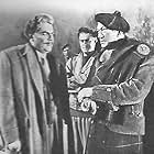 Orson Welles, John McCallum, and Victor McLaglen in Trouble in the Glen (1954)