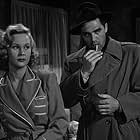 Steve Cochran and Virginia Mayo in White Heat (1949)