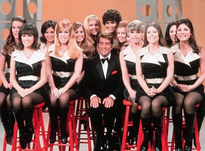 Dean Martin, Susie Ewing, Sheryl Ullman, Sheila Allan, Jackie Chidsey, Peggy Hansen, Debi McFarland, Paula Cinko, The Golddiggers, Nancy Bonetti, Rosie Cox Gitlin, Suzy Cadham, and Michelle DellaFave in The Dean Martin Show (1965)