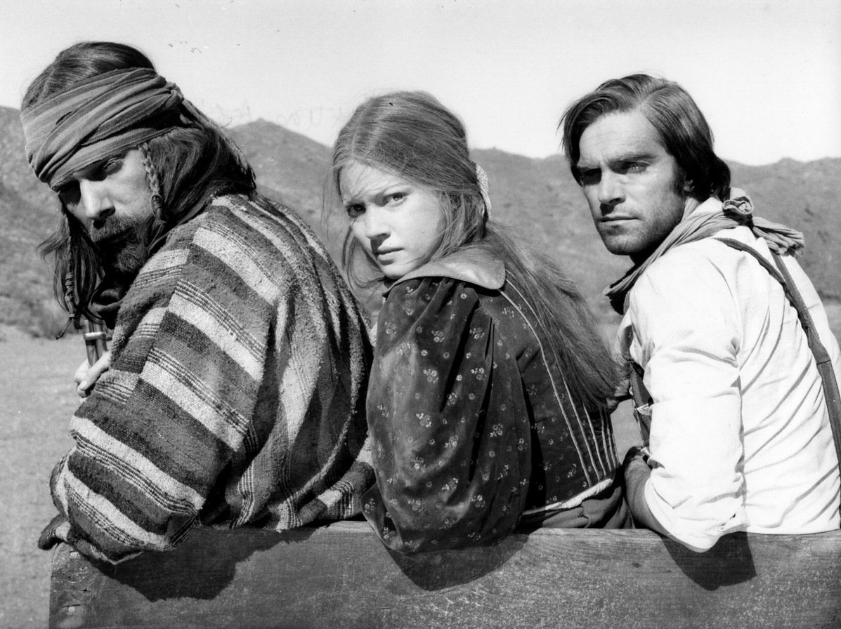 Lynne Frederick, Tomas Milian, and Fabio Testi in The Four of the Apocalypse... (1975)