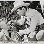 Johnny Mack Brown and Tom Quinn in The Navajo Trail (1945)