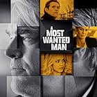 Willem Dafoe, Philip Seymour Hoffman, Robin Wright, and Rachel McAdams in A Most Wanted Man (2014)