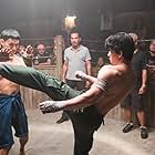 Tiger Hu Chen and Iko Uwais in Triple Threat (2019)