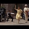 Geoffrey Holder, Roger Minami, and Ann Reinking in Annie (1982)