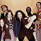 John Belushi, Dan Aykroyd, Chevy Chase, Jane Curtin, Garrett Morris, Laraine Newman, and Gilda Radner in Saturday Night Live (1975)