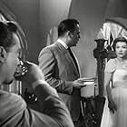 Anne Baxter, Herbert Lom, and Richard Todd in Chase a Crooked Shadow (1958)