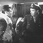 Bryan Forbes and William Sylvester in Raiders in the Sky (1953)