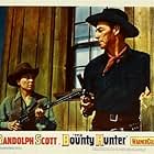 Randolph Scott and Marie Windsor in The Bounty Hunter (1954)