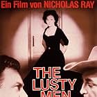 Robert Mitchum, Susan Hayward, Arthur Kennedy, and Nicholas Ray in The Lusty Men (1952)