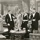 Edward Everett Horton, Robert Ames, Mabel Forrest, Creighton Hale, Ann Harding, and Hedda Hopper in Holiday (1930)