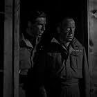 Derek Bond and Basil Radford in The Captive Heart (1946)