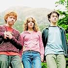 Timothy Spall, Rupert Grint, Daniel Radcliffe, and Emma Watson in Harry Potter and the Prisoner of Azkaban (2004)