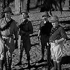 Reginald Denny, Wallace Ford, J.M. Kerrigan, and Victor McLaglen in The Lost Patrol (1934)
