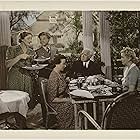 Mickey Rooney, Sara Haden, Fay Holden, Cecilia Parker, and Lewis Stone in Andy Hardy's Double Life (1942)