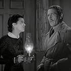 Dorothy Adams and Kenneth MacDonald in The Devil Commands (1941)