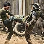 Tiger Hu Chen and Iko Uwais in Triple Threat (2019)
