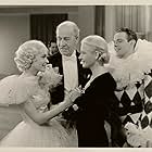 Maureen O'Sullivan, Ann Harding, Louis Hayward, and Henry Stephenson in The Flame Within (1935)