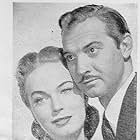 Kristine Miller and Zachary Scott in Shadow on the Wall (1950)