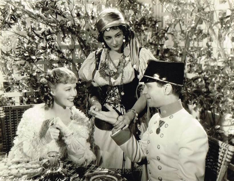 Grace Moore, Eve Southern, and Franchot Tone in The King Steps Out (1936)