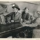 Lon Chaney Jr., Robert Taylor, Frank Puglia, and Joe Yule in Billy the Kid (1941)