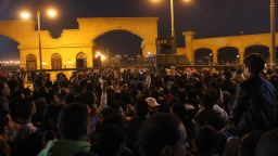Soccer fans confront police outside a stadiumm in a Cairo suburb on Sunday, February 8.  A riot broke out  ahead of a scheduled match between Zamalek and ENPPI. The match went ahead.