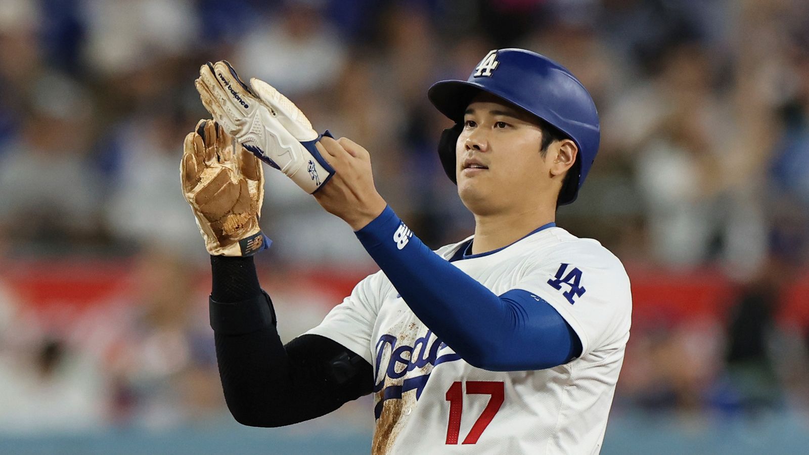 Los Angeles Dodgers Japanese Shohei Ohtani reacts after stealing second base during the second inning.